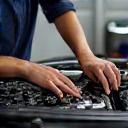 Premium oil change with technician and car